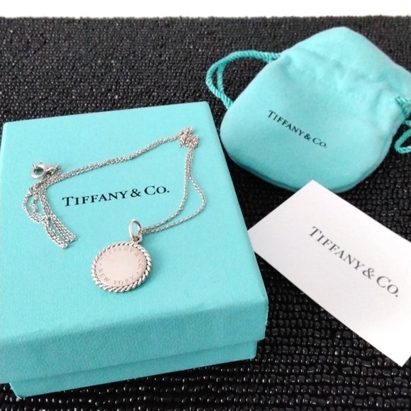 Tiffany & Co. Jewelry - Authentic Tiffany & Co. Necklace with twist round pendant